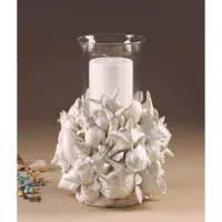 Picture A small candlestick in the shape of sea shells and starfish