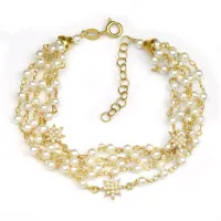 Picture Wonderful Italian Bracelet Made of 18-karat gold-plated silver with white zircons and pearls