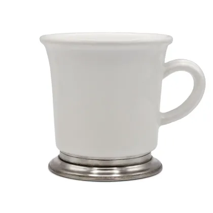 Picture White ceramic and pewter mug from an Italian manufacturer