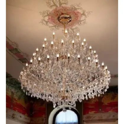 Zdjęcie Luksusowy żyrandol z pozłacaną metalową ramą pokrytą przezroczystym szkłem z wisiorkami z przezroczystego kryształu - Il Paralume Marina