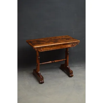 Picture A stunning rosewood William IV gaming table featuring a foldable top surrounding a green playing surface
