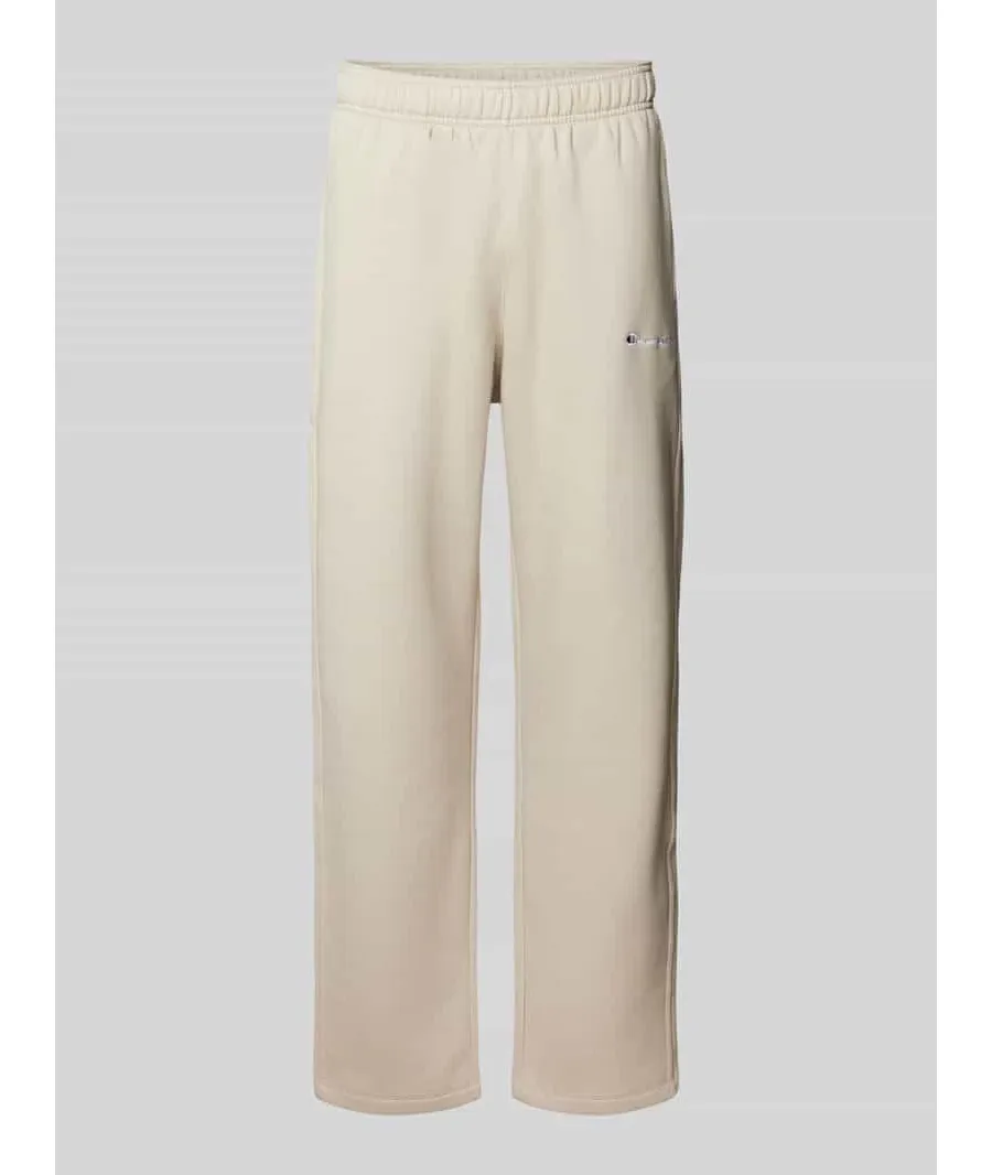 obrazek 1 Spodnie dresowe o kroju straight fit z wyhaftowanym logo