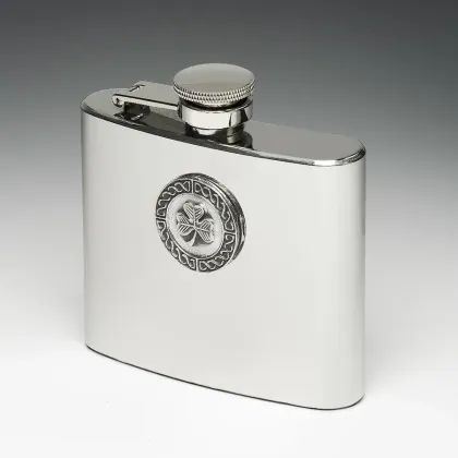 Picture A unique whiskey flask decorated with a tin disc with the symbol of Ireland - a clover