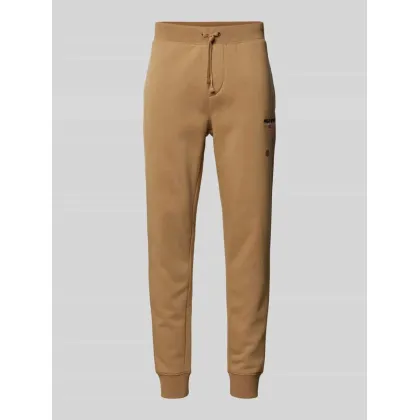 Zdjęcie Spodnie dresowe o kroju slim fit z wyhaftowanym logo