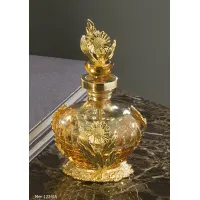 Picture Exclusive perfume bottle made of engraved crystal and gilded bronze