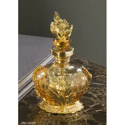Zdjęcie Ekskluzywna butelka na perfumy z grawerowanego kryształu i złoconego brązu