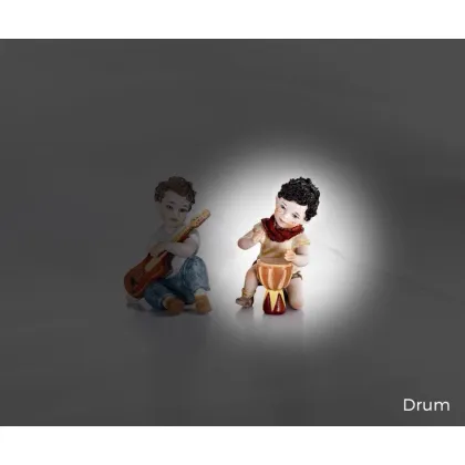 Zdjęcie Figurka chłopczyka grającego na bongo - Drum
