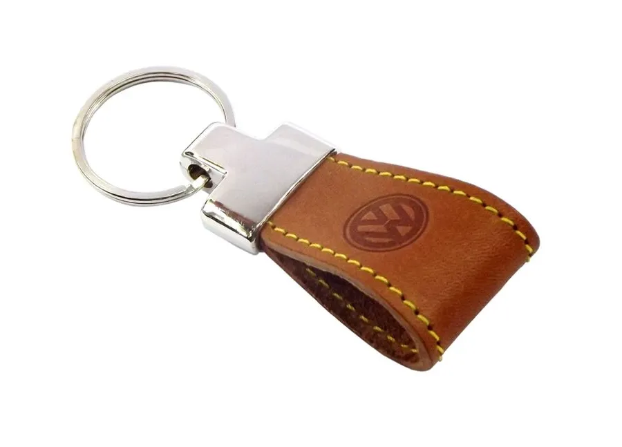 obrazek 1 Cudowny drobiazg z logo firmowym - brelok 8,5 x 3 cm ze skóry naturalnej