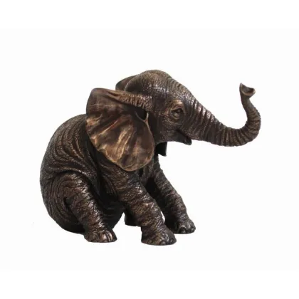 Picture Figurine of a small sitting elephant 16x8x11 cm