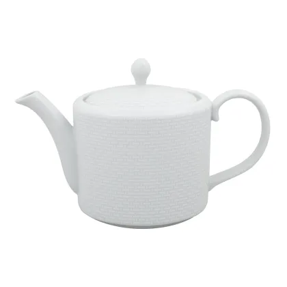 Picture A white classic tea pot from the Cesta collection with a unique relief decoration - Vista Alegre