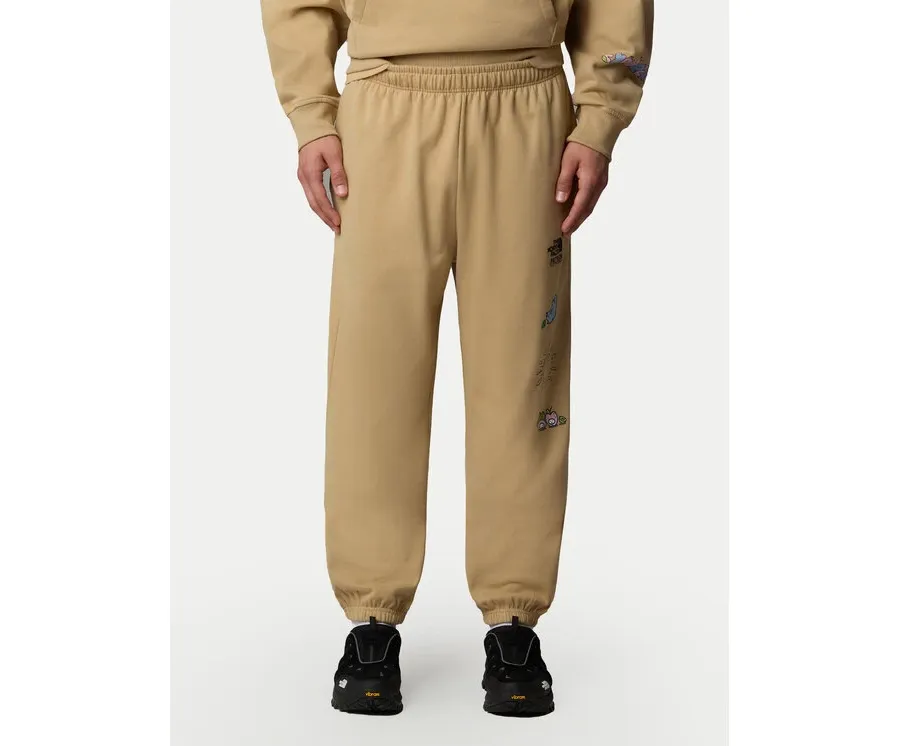 obrazek 1 The North Face Spodnie dresowe Unisex Mountain Cleanup NF0A8C2W Beżowy Relaxed Fit