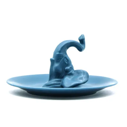 Picture An original decorative plate with an elephant head in many color variants