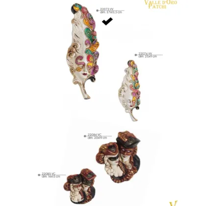 Picture An unusual feather with a female face - Valle d'oro Patchi