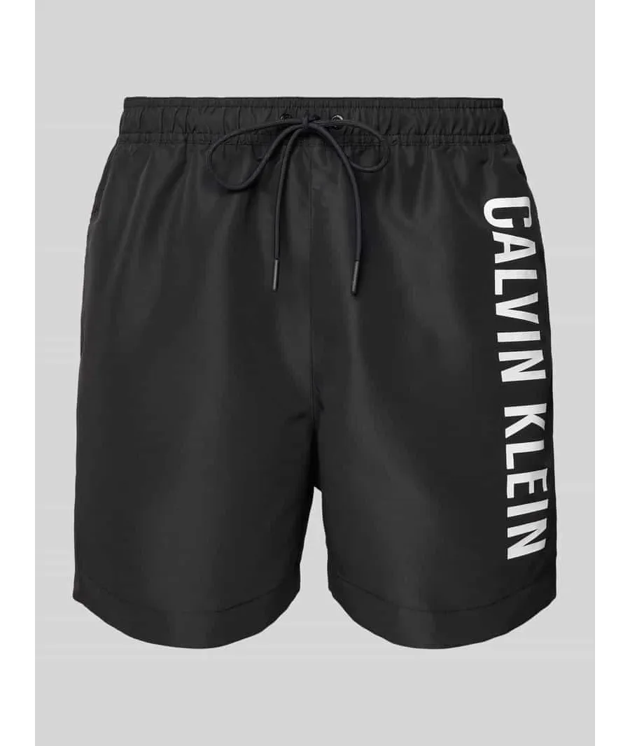 obrazek 1 Spodenki kąpielowe o kroju regular fit z nadrukiem z logo