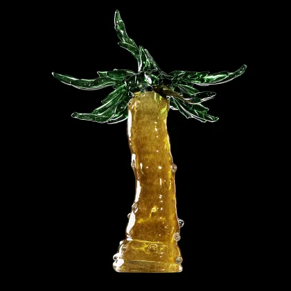 Zdjęcie Pień palmy bursztynowej z zielonymi liśćmi Murano