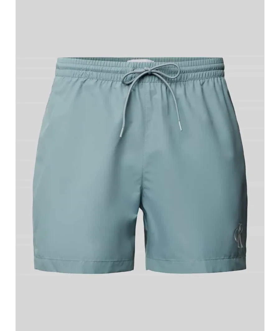 obrazek 1 Spodenki kąpielowe o kroju regular fit z nadrukiem z logo