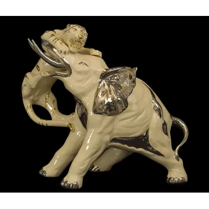 Picture Figure of an elephant fighting a tiger