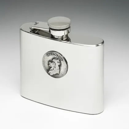 Picture A stainless steel hip flask decorated with a tin disc with a map of Ireland