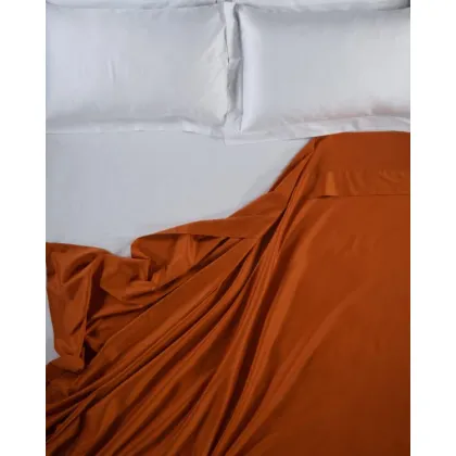 Zdjęcie Pomarańczowe prześcieradło bawełniane do sypialni