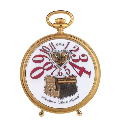 Zdjęcie Złocony zegarek na biurko/do podróży