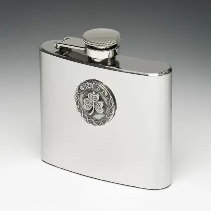 Picture A stainless steel hip flask decorated with a tin disc with a clover
