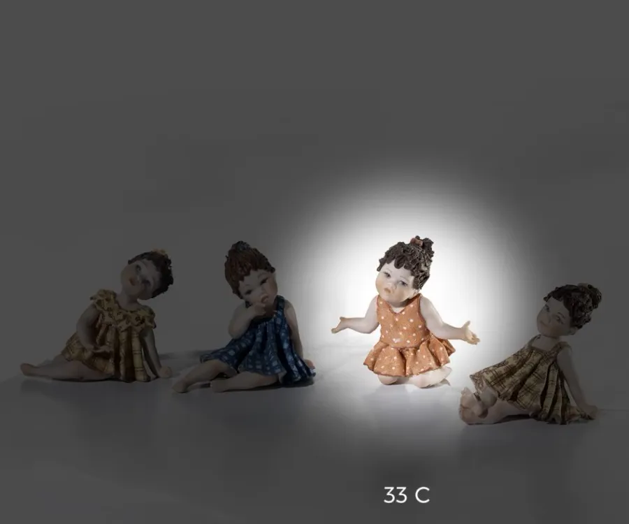 obrazek 1 Lalka porcelanowa dziewczynki w łososiowej sukience - Sibania