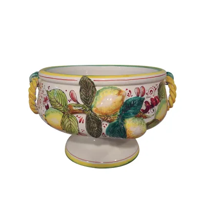 Picture Italian ceramic plate with a fruit relief in a country style