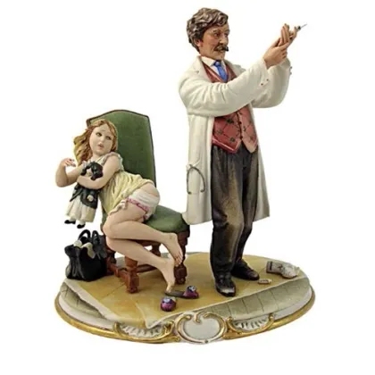 Zdjęcie Doktor z małą dziewczynką - porcelanowa figurka do luksusowych wnętrz