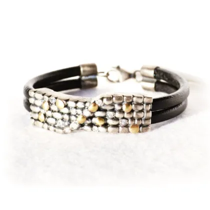 Picture Extraordinary bracelet made of silver, gold and leather