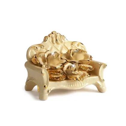 Zdjęcie Niebywała figurka ozdobna sofy i kwiatów z ceramiki