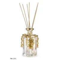 Picture Exclusive room fragrance bottle made of engraved crystal and gilded bronze