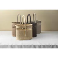 Picture Natural wicker wine basket with a rattan handle