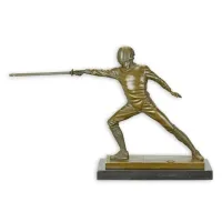 Picture A unique sculpture of a fighting swordsman made of bronze