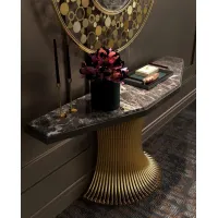 Picture A unique console with a marble top on bent brass tubes