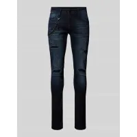 Zdjęcie Jeansy o kroju tapered fit z efektem znoszenia