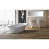 Zdjęcie Unikalna wanna do łazienki z wirującym owalnym kształtem i delikatnie asymetrycznym brzegiem