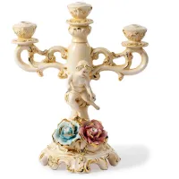 Picture A solidly made ceramic candle holder with decorations
