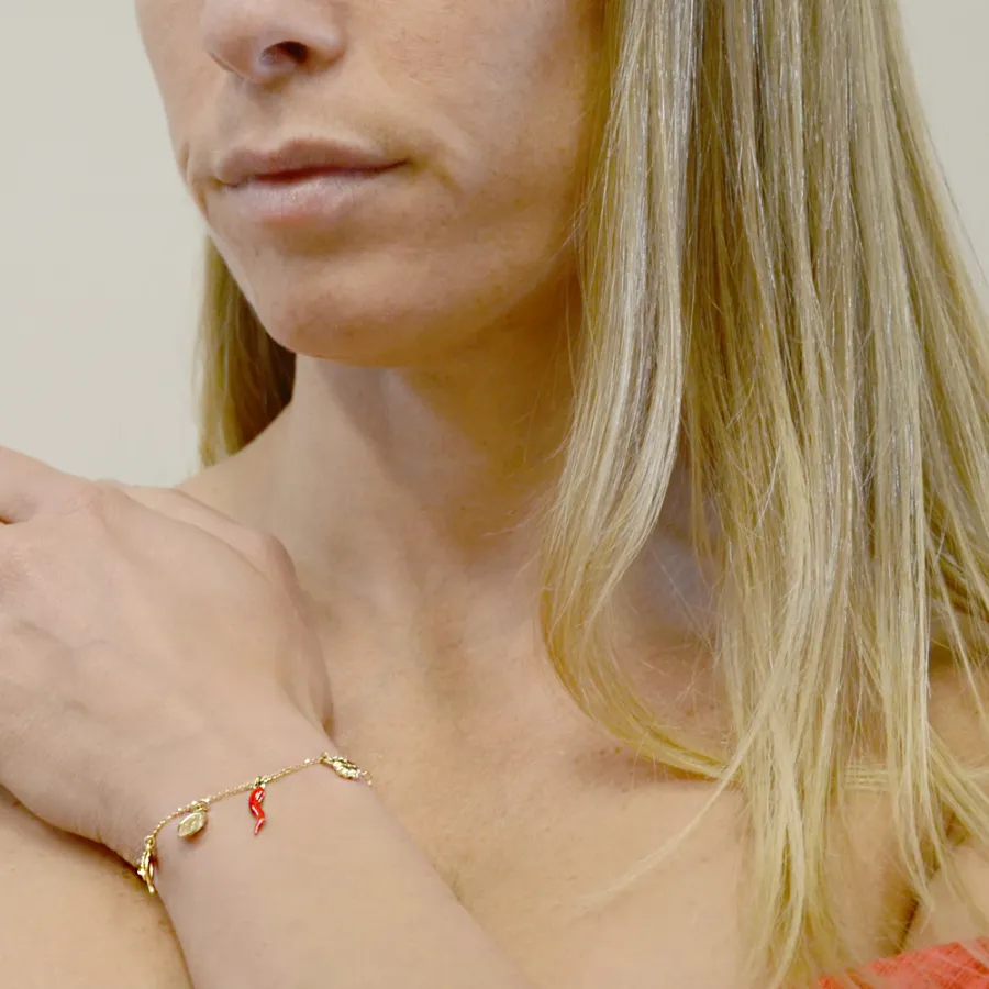 obrazek 2 Bransoletka z 18-karatowego żółtego złota z zawieszkami