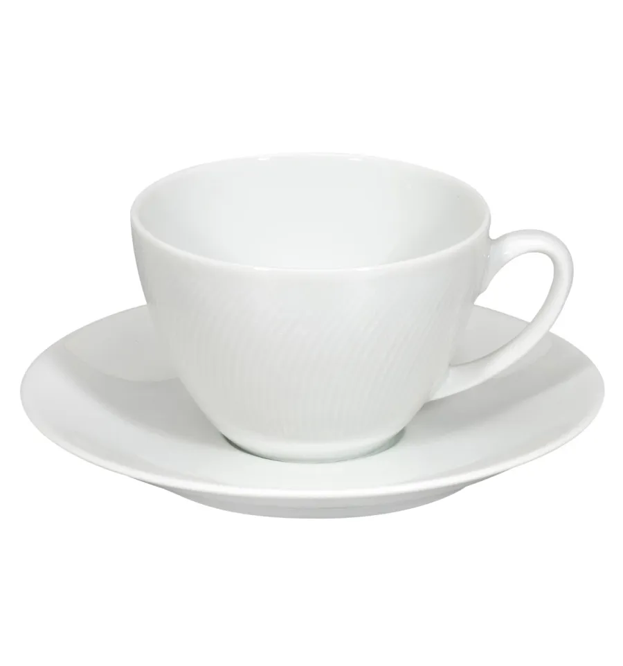 obrazek 1 Porcelanowa filiżanka śniadaniowa ze spodkiem z kolekcji Spirit White z delikatnym reliefowym zdobieniem - Vista Alegre