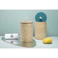 Picture Tall cylindrical wicker container with wooden or leather lid and woven handle