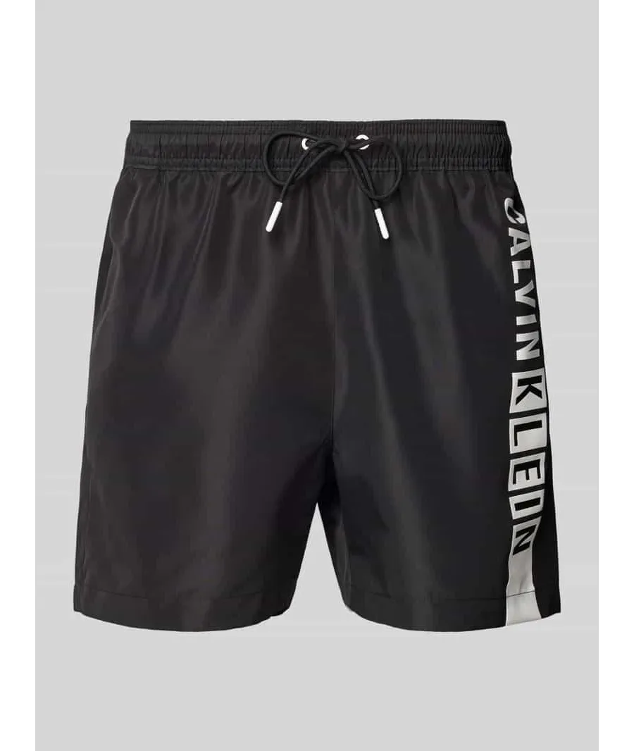 obrazek 1 Spodenki kąpielowe o kroju regular fit z nadrukiem z logo