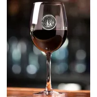 Picture An unusual wine glass with a decorative letter