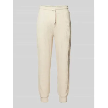 Zdjęcie Spodnie dresowe z detalami z logo model ‘Structure’