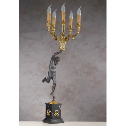 Picture A unique desk lamp with a figurine