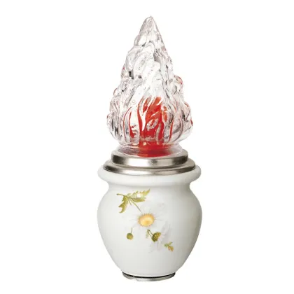 Zdjęcie Biała lampa porcelanowa ozdobiona stokrotkami na nagrobki