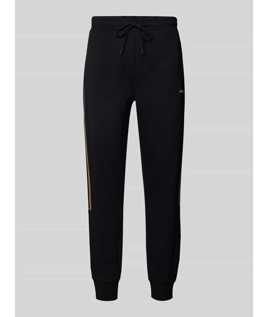 obrazek 1 Spodnie dresowe o kroju tapered fit z detalem z logo model ‘Hadikonos’