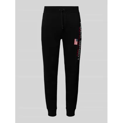 Zdjęcie Spodnie dresowe o kroju slim fit z nadrukiem z logo