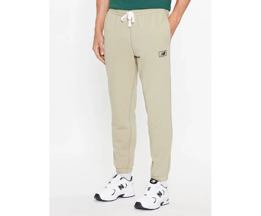 obrazek 1 New Balance Spodnie dresowe NB Essentials Sweatpant MP33509 Zielony Regular Fit