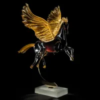 Picture A prestigious living room sculpture depicting a golden Pegasus