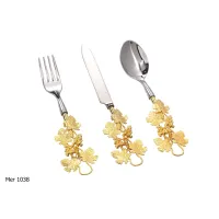 Zdjęcie Ekskluzywne sztućce stalowe z uchwytem z pozłacanego brązu